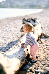 Full length of cute girl on land