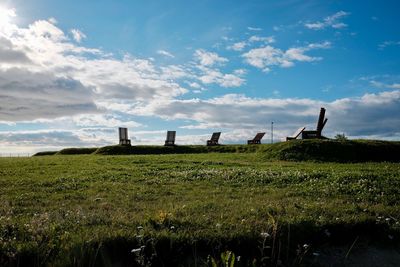 Scenic view of field against sky