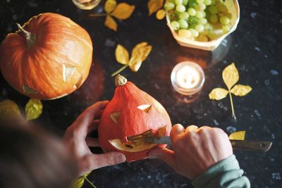 High angle view of pumpkins on cutting board