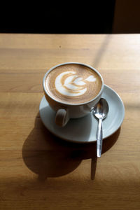 Coffee cup on table