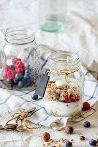 Close-up of ice cream in jar on table