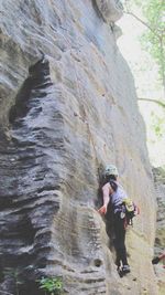 Full length of man standing on rock