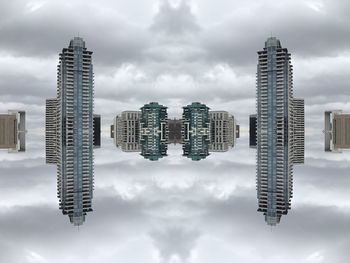 Digital composite image of buildings against sky
