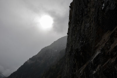 Low angle view of mountains against sky