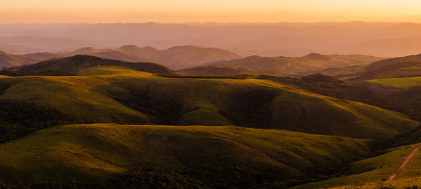 Scenic view of mountains against sky during sunset