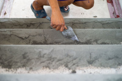 Midsection of man working at construction site