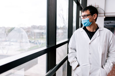 Male scientist in white coat