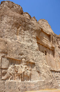 Low angle view of historical temple building against clear sky