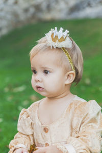 Portrait of cute girl looking away