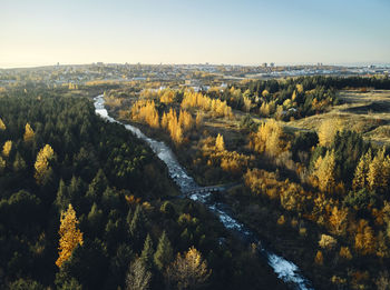 Fast river through autumn countryside