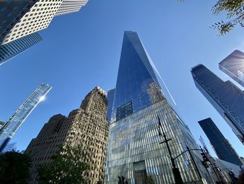 Low angle view of buildings against blue sky