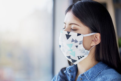 Close-up of woman wearing mask