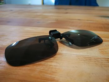 Close-up of sunglasses on table