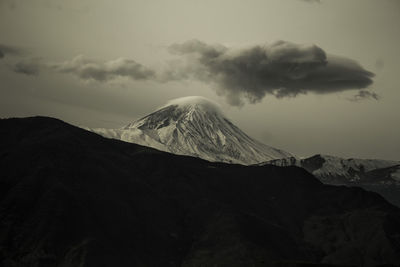 Damavand peak was eye-cathing while it was surrounded by dark clothes