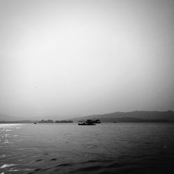 Boat sailing in sea