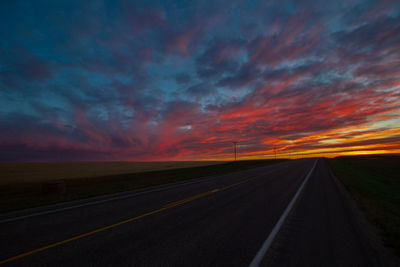 Road against sky during sunset