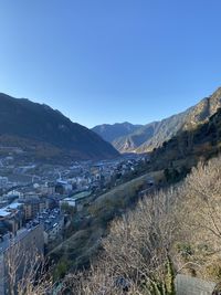 Scenic view of mountains against clear blue sky
