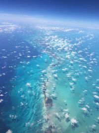 Aerial view of sea and blue sky