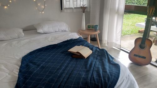 Book on bed at home