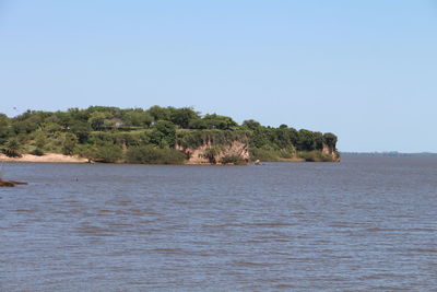 Scenic view of sea against clear sky