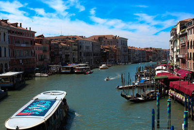 Boats moored in city