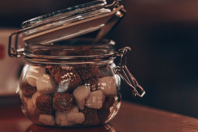 Close-up of glass jar on table