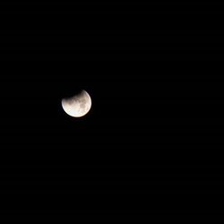 Low angle view of moon in sky