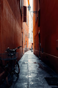 Narrow alley amidst buildings in city