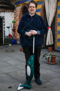 Low section of woman standing on street