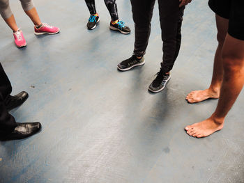 Low section of people standing on floor