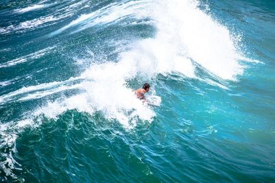 Man surfing in sea