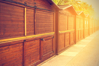 Wooden fence by building