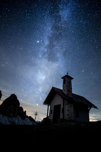 Low angle view of building against sky at night