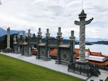 Panoramic view of buildings against sky in city