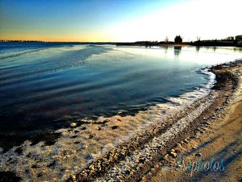 Scenic view of sea against clear sky