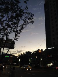 View of city street at dusk