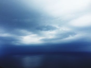 Scenic view of sea against dramatic sky