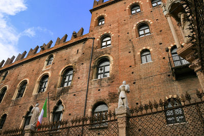 Low angle view of old building against sky