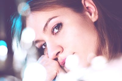 Close-up portrait of young woman