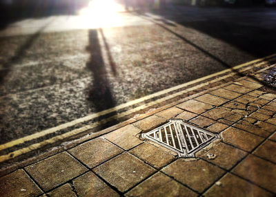 Close-up of manhole on street