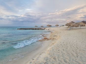 Scenic view of beach against sky