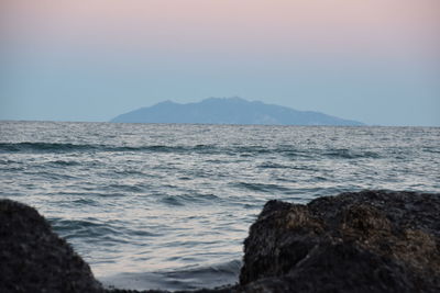 Scenic view of sea against clear sky