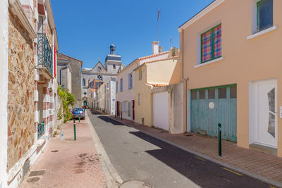 Street amidst buildings in town