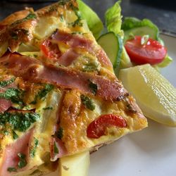 Close-up of pizza served in plate