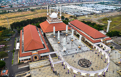 High angle view of temple amidst buildings in city