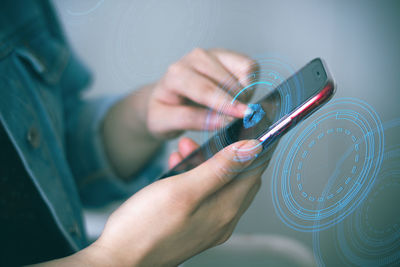 Close-up of hand holding camera