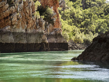 Scenic view of river amidst rock formation