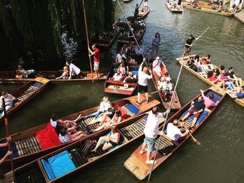 High angle view of people relaxing in river