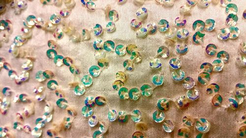 Close-up of sequins on fabric