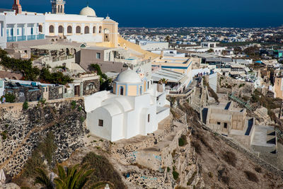 The city of fira the catholic church of st. stylianos and the aegean sea in santorini island